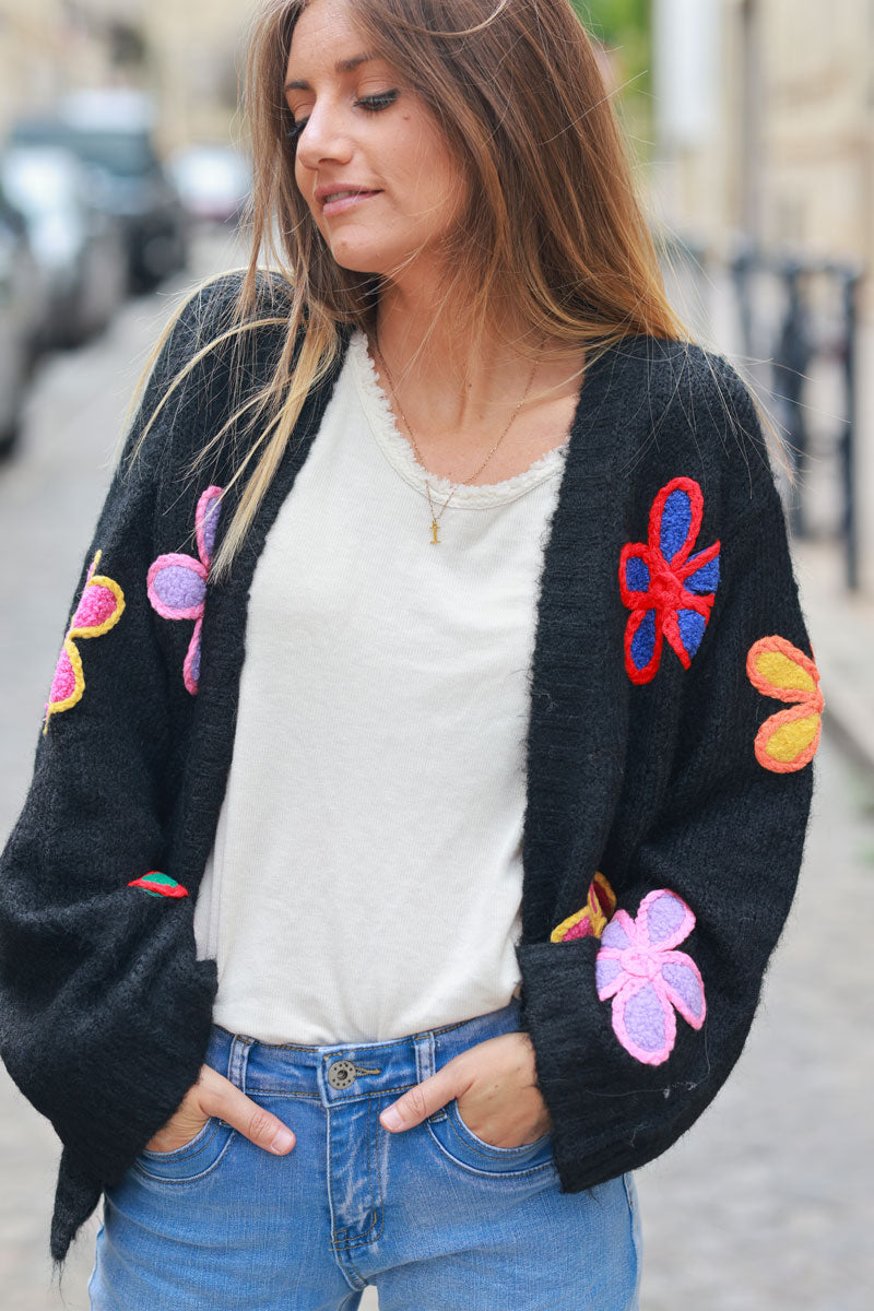 Black soft knit cardigan with vibrant flower embroidery