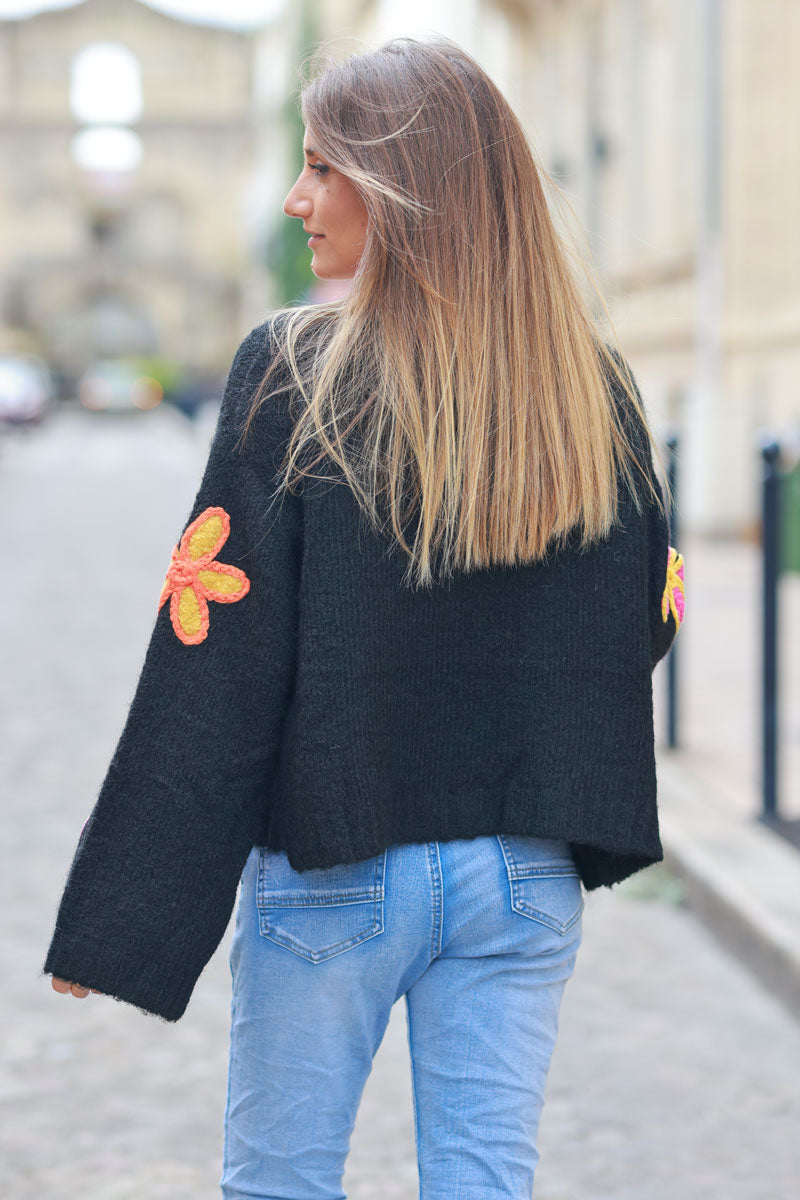 Black soft knit cardigan with vibrant flower embroidery