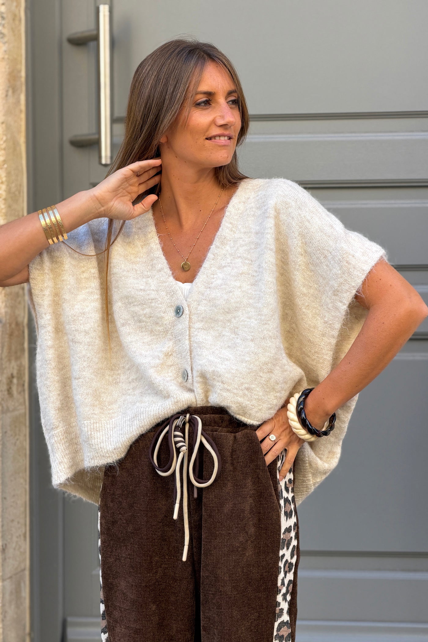 Gilet sans manches beige coupe loose en maille chinée boutons nacrés
