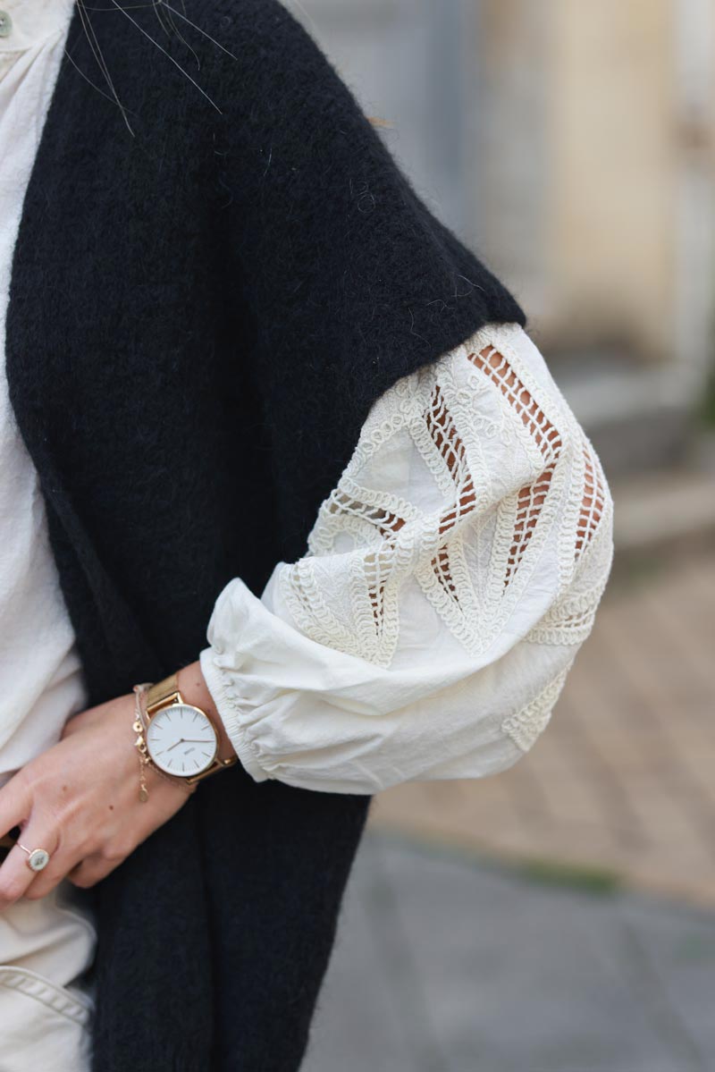 Black sleeveless chunky knit gilet