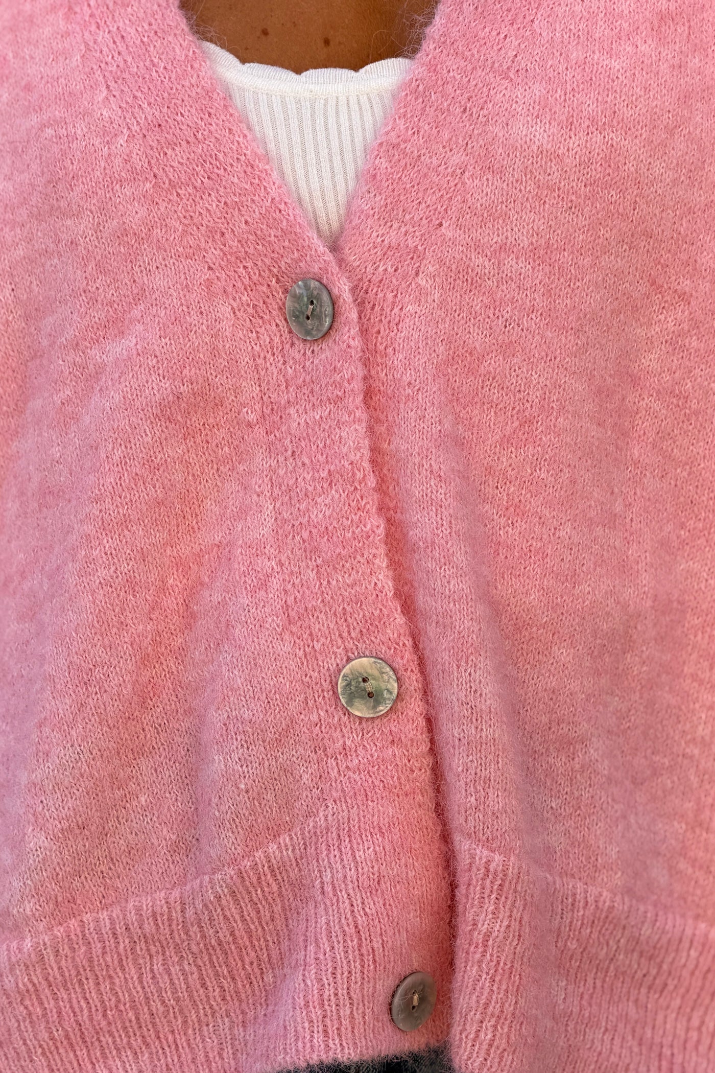 Gilet sans manches rose coupe loose en maille chinée boutons nacrés