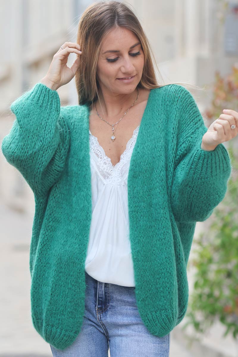 green chunky knit cardigan with puff sleeves