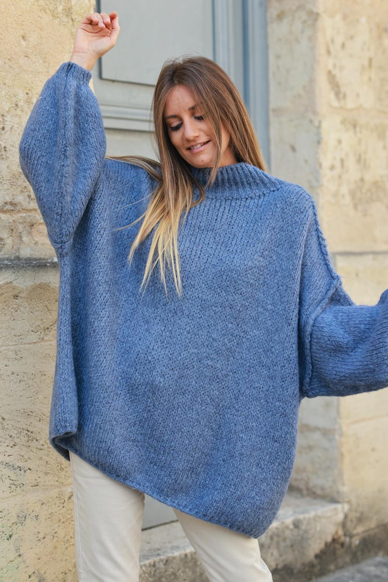 Gros pull large bleu jean en maille chaude couture apparente