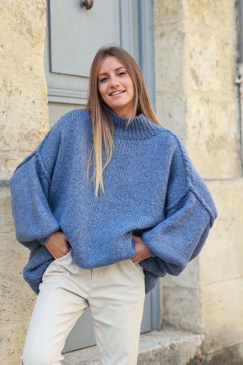 Gros pull large bleu jean en maille chaude couture apparente