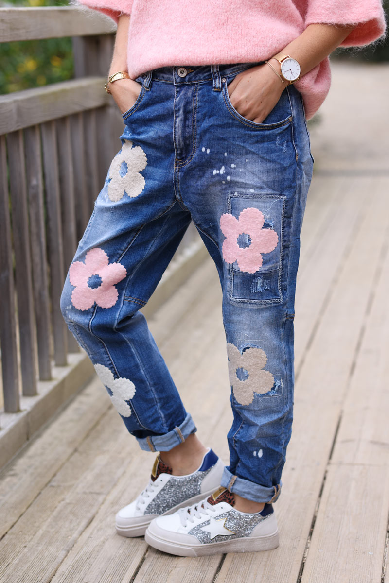 Mid washed distressed loose fit jeans with flower embroidery