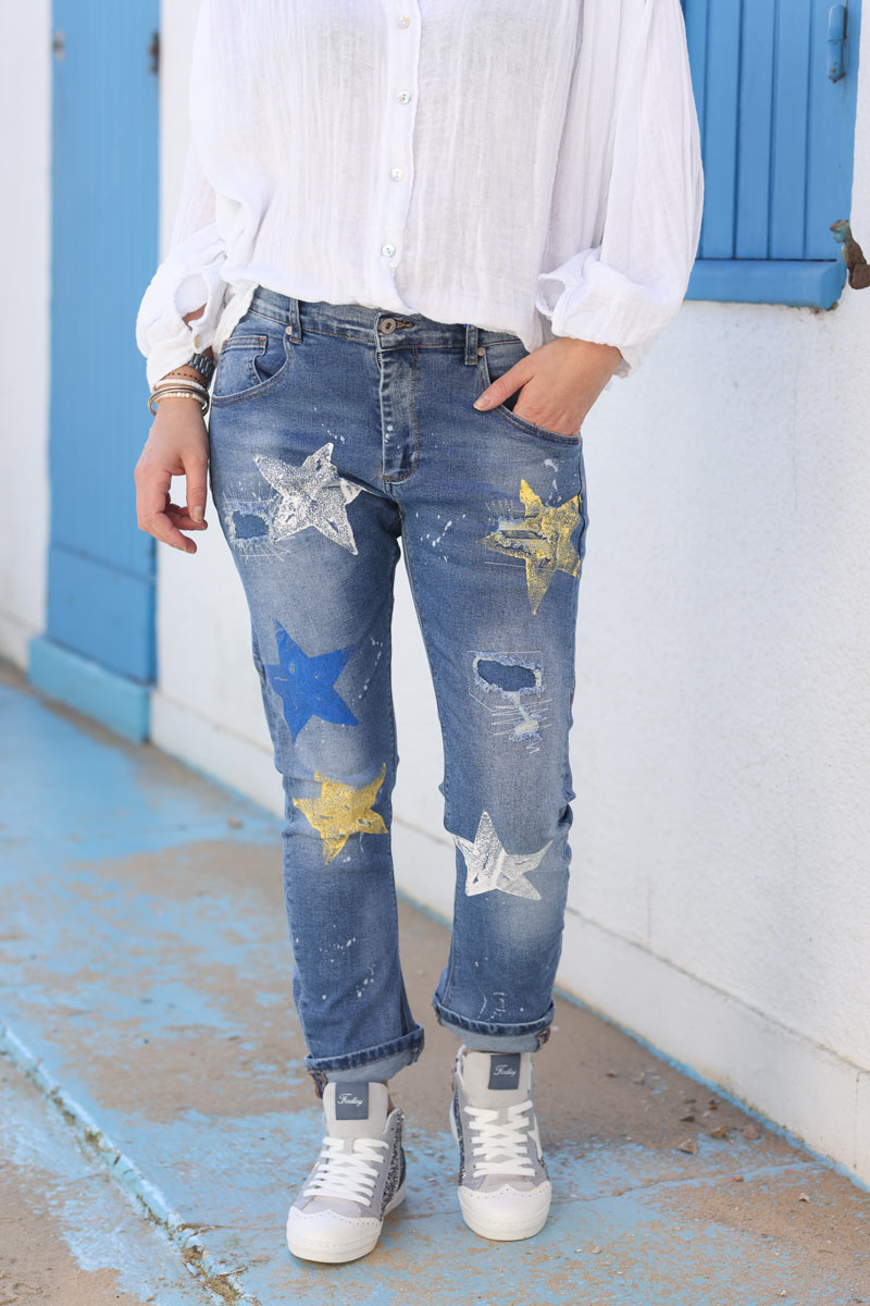 Mid wash faded jeans with paint star print and splatter effect