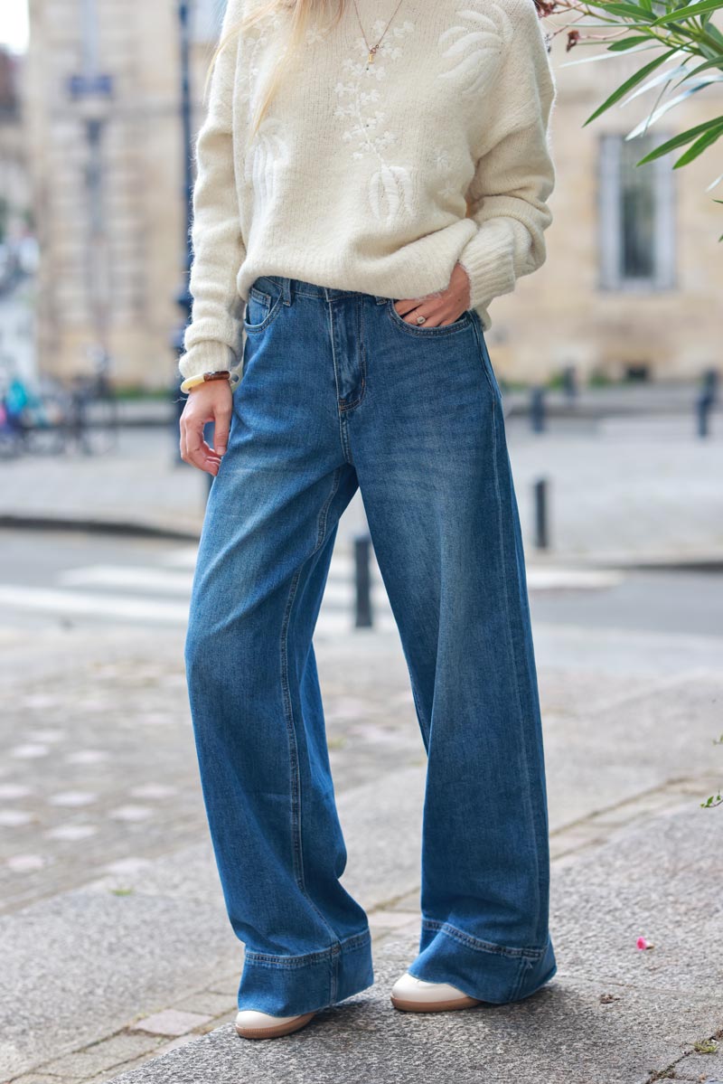 High-waisted wide-leg washed jeans with large hem