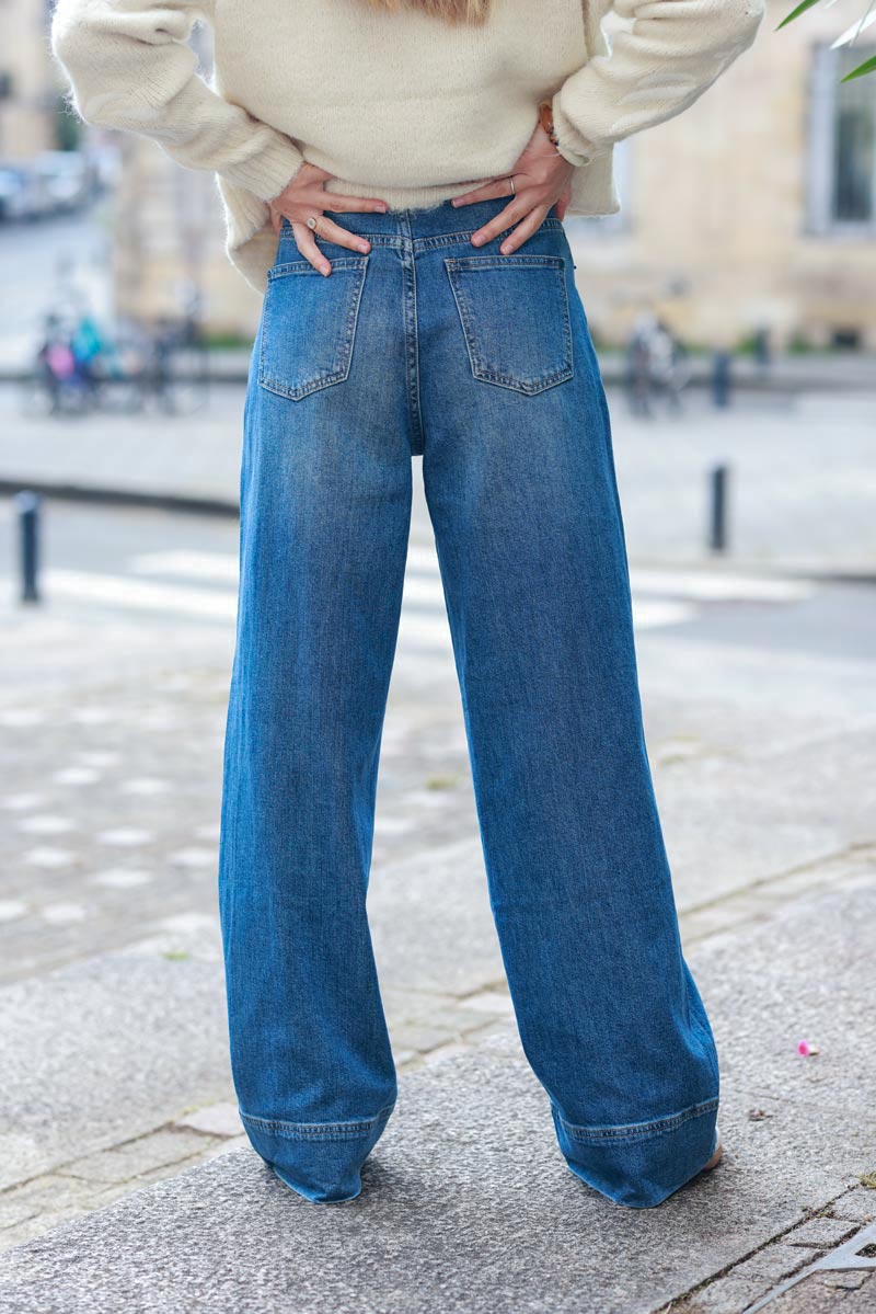 High-waisted wide-leg washed jeans with large hem