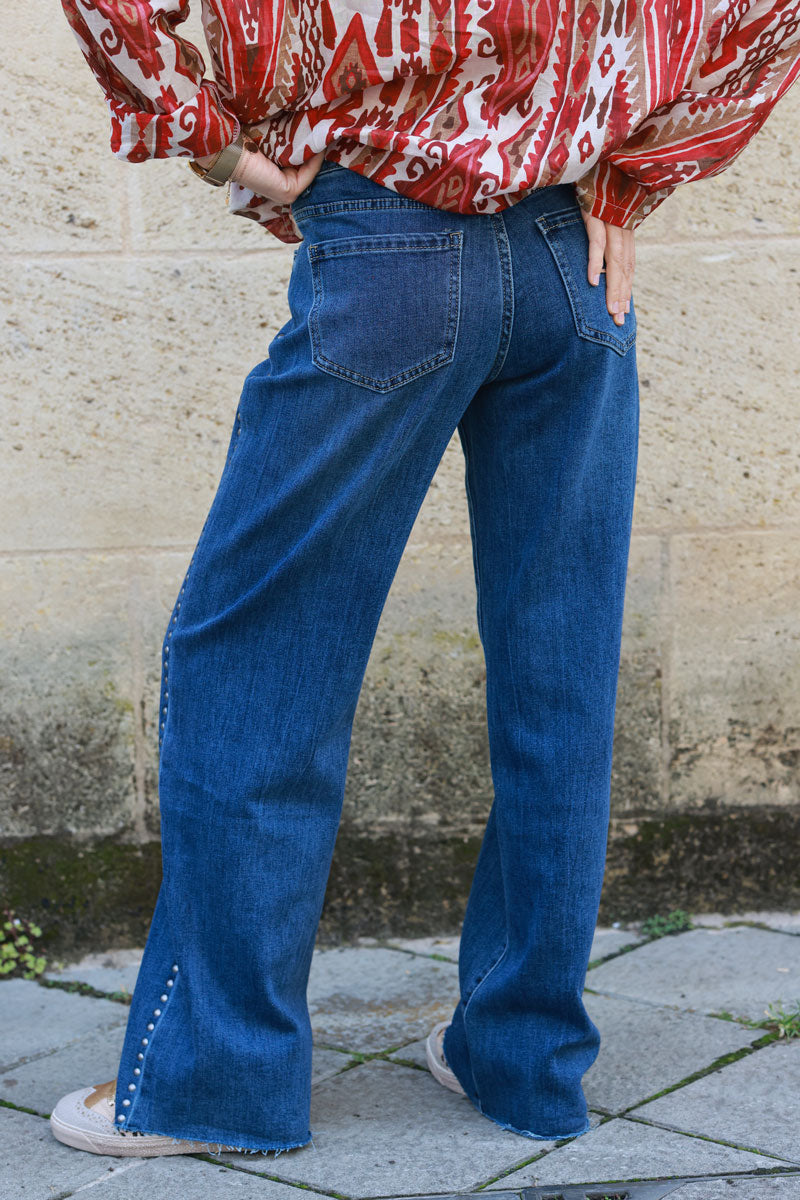 Washed denim wide straight leg jeans, stud and unfinished hems