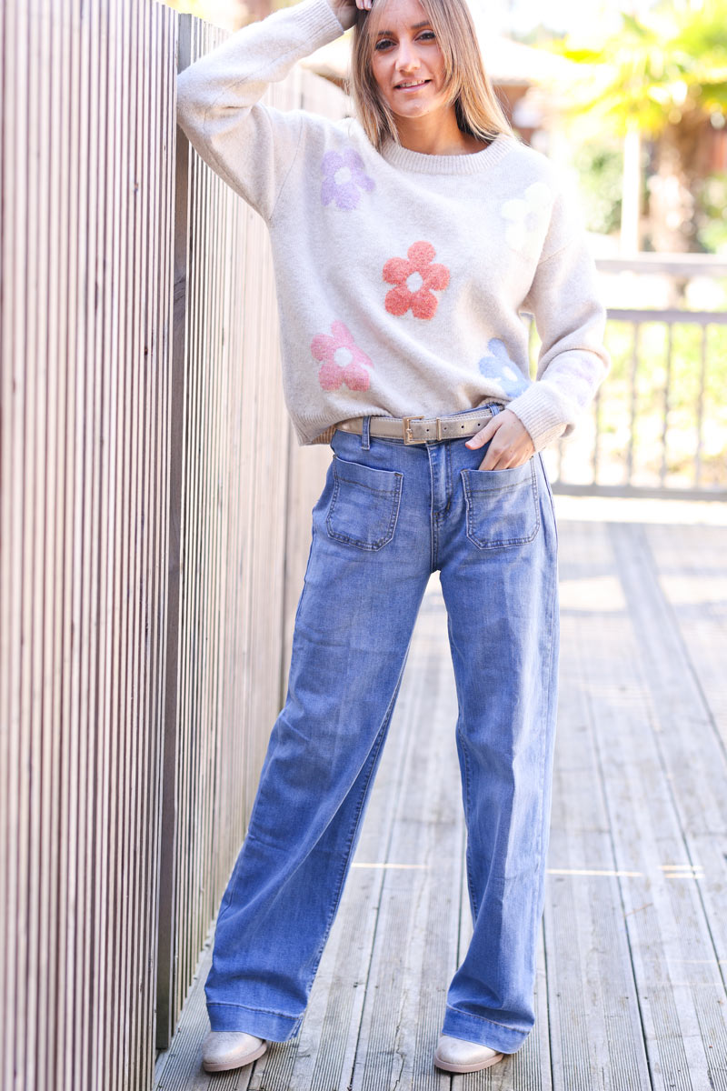 Wide leg light wash jeans with patch pockets