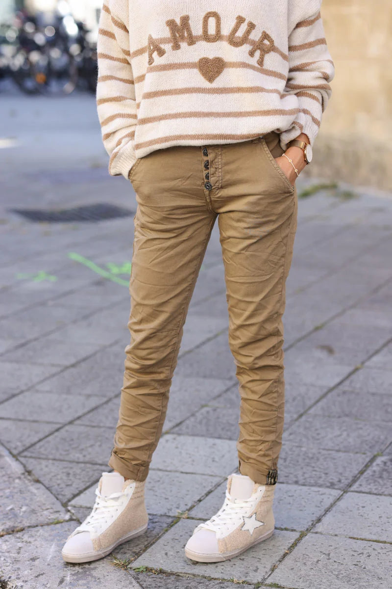 Slim fit ice brown jeans with silver ankle hem edging