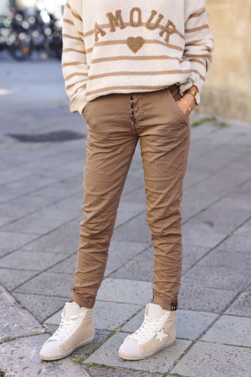 Slim fit ice brown jeans with silver ankle hem edging