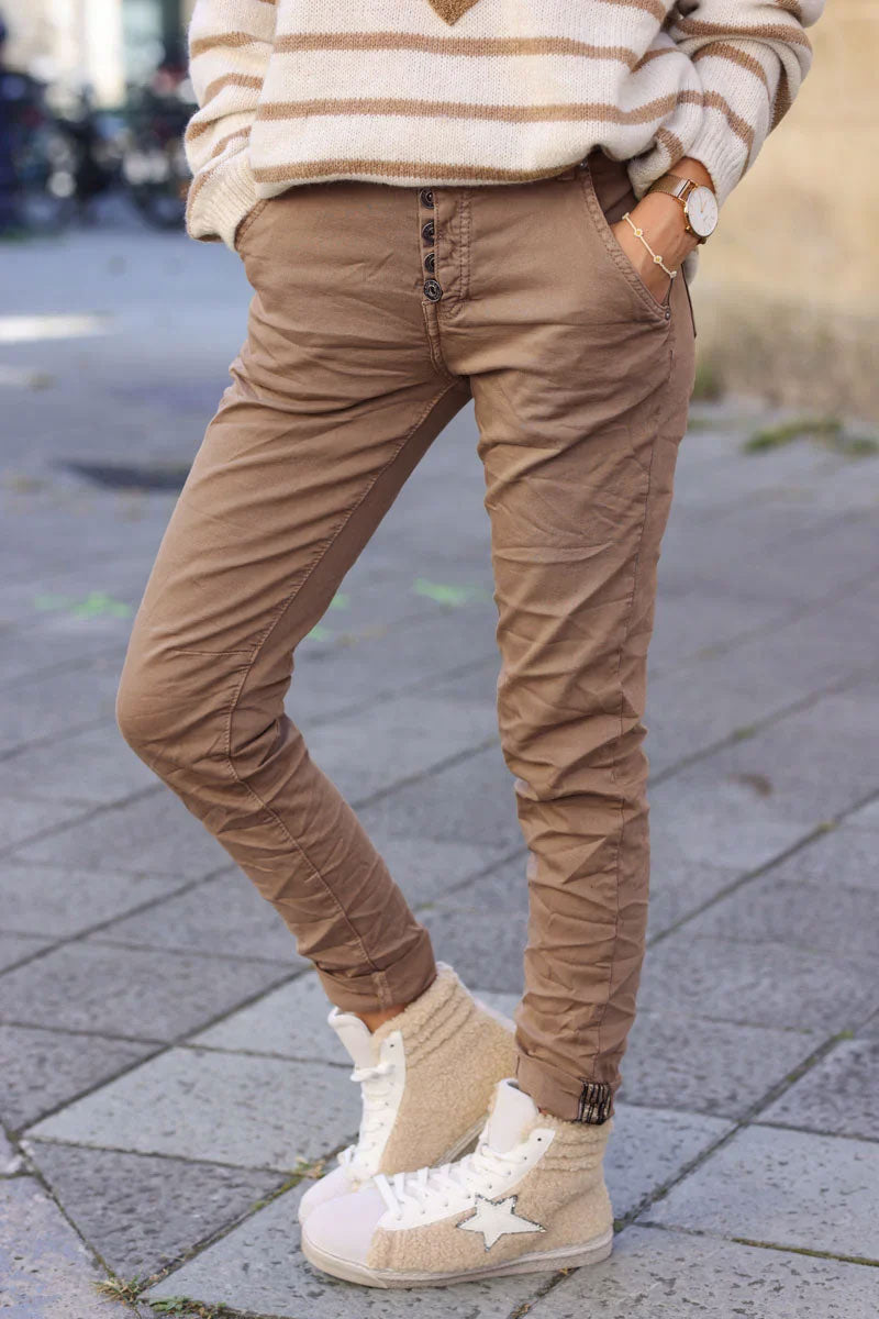 Slim fit ice brown jeans with silver ankle hem edging