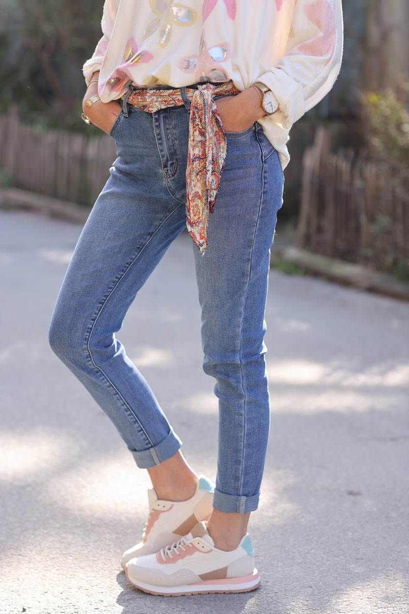 Medium washed stretch slim fit jeans with motif scarf belt