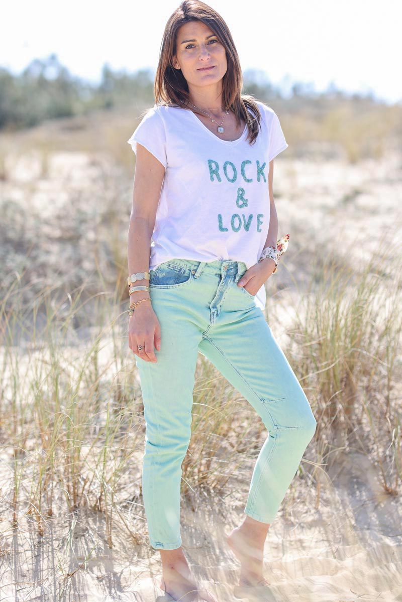 Water green high rise jeans in a washed denim