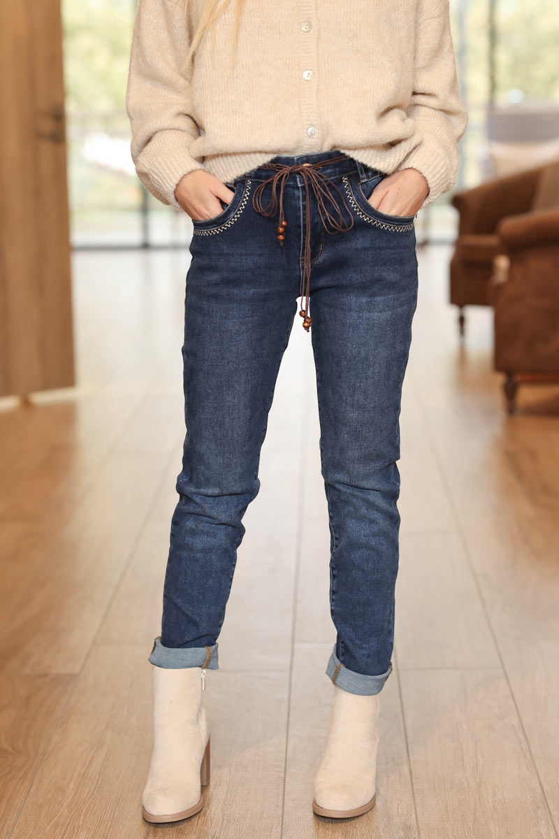 Slim fit dark washed jeans with embroidered pockets and removable belt