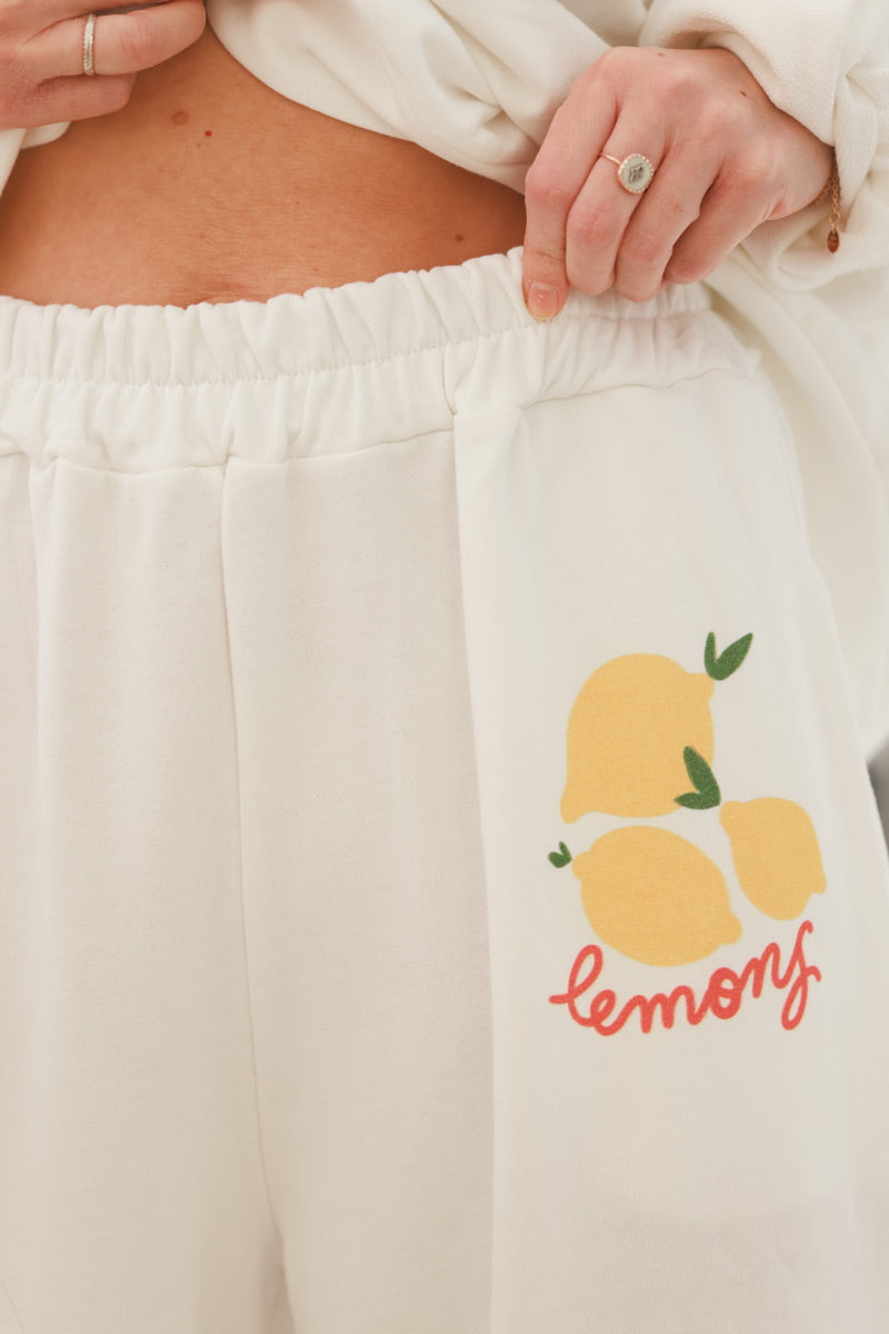 Pantalón de jogging blanco con corte amplio y cómodo, cintura elástica, limones, limones lavados