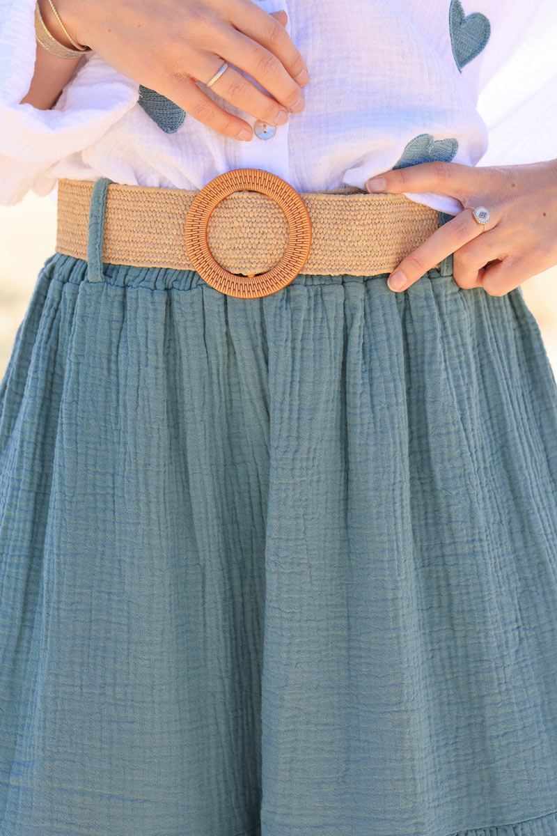 Celadon green crinkle cotton gauze tiered maxi skirt with raphia belt