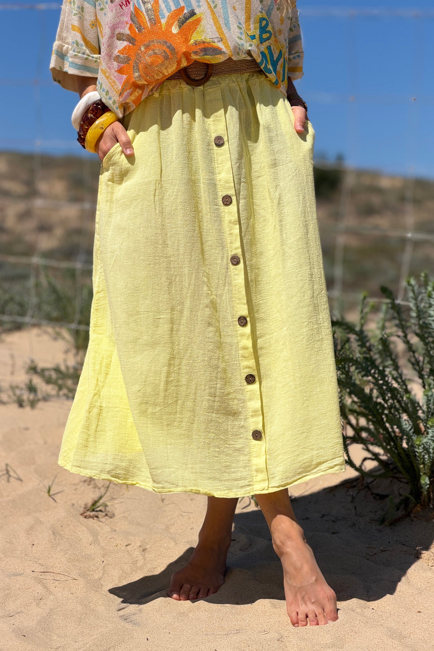 Jupe midi jaune en coton faux boutons bois et taille élastique