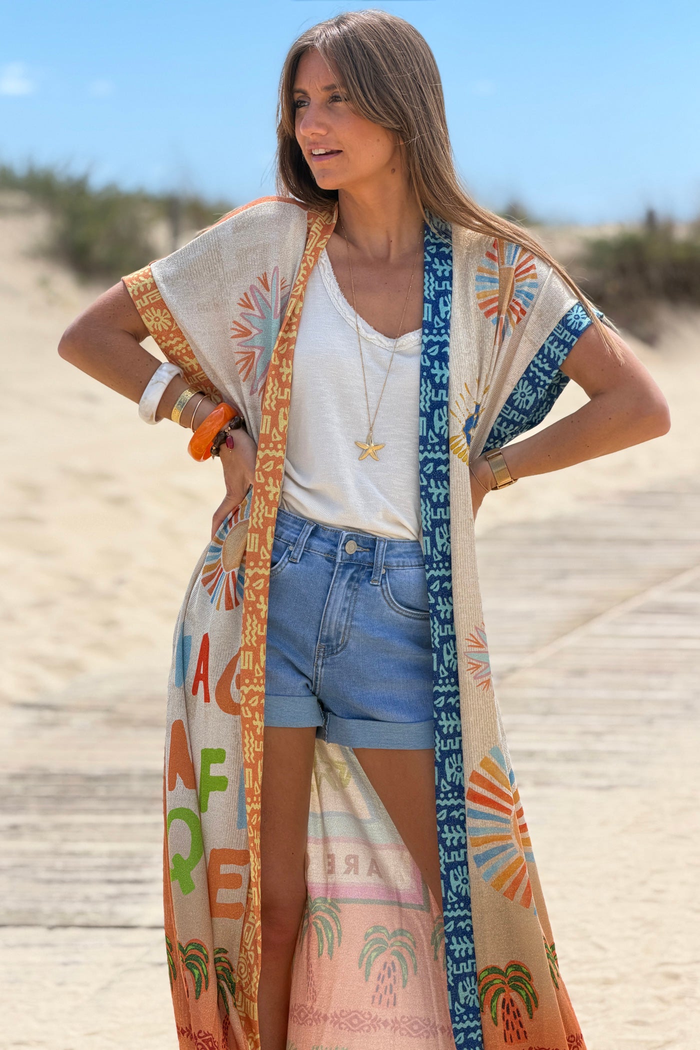 Beige “Amazing Things Are Coming” Glitter Knit Duster
