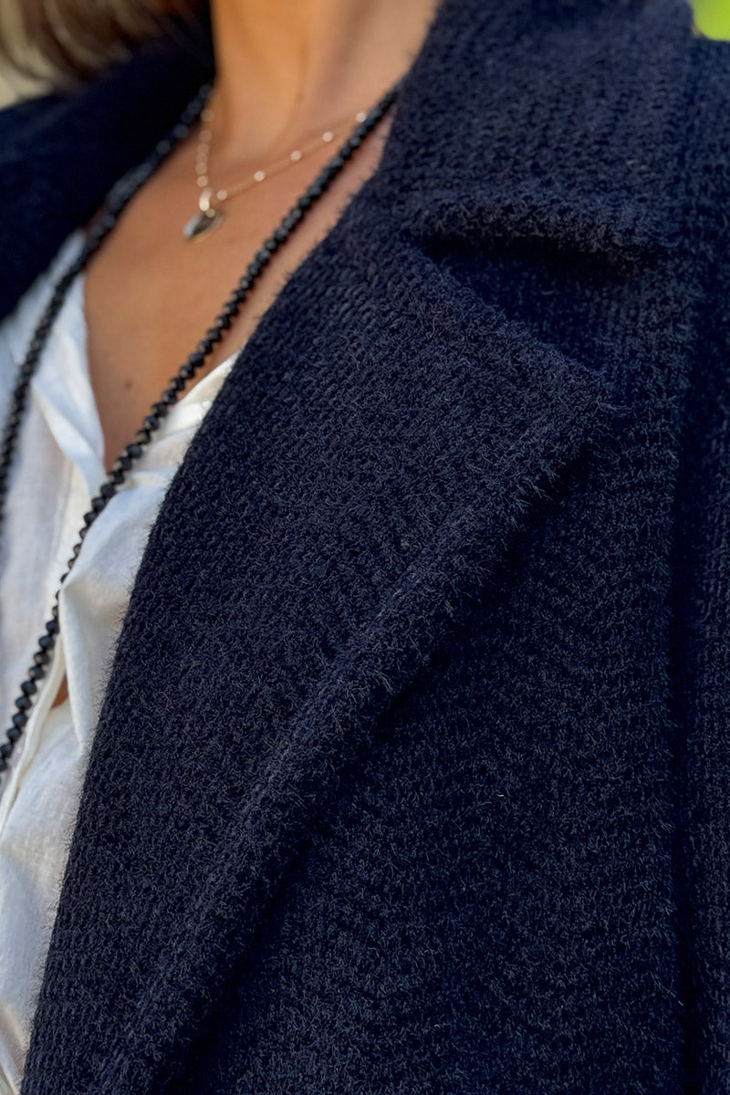 Manteau noir long et doux en maille chenille