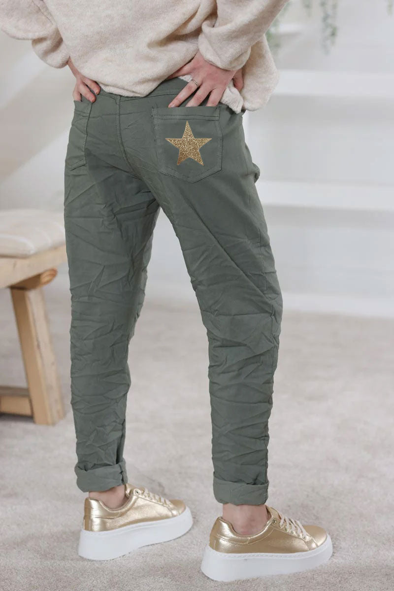 Olive comfort and stretch fabric pants with a glitter star