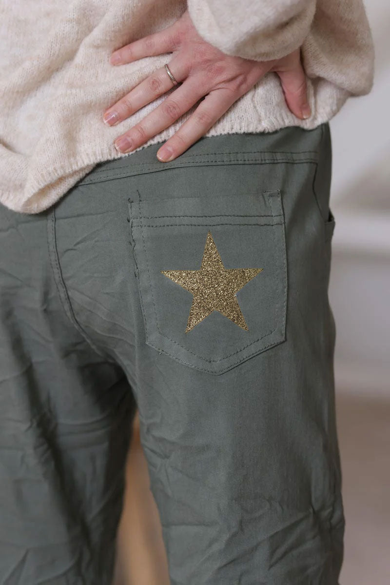 Olive comfort and stretch fabric pants with a glitter star