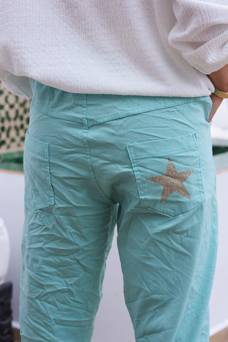Pantalon confort turquoise en toile stretch étoile brillante paillettes