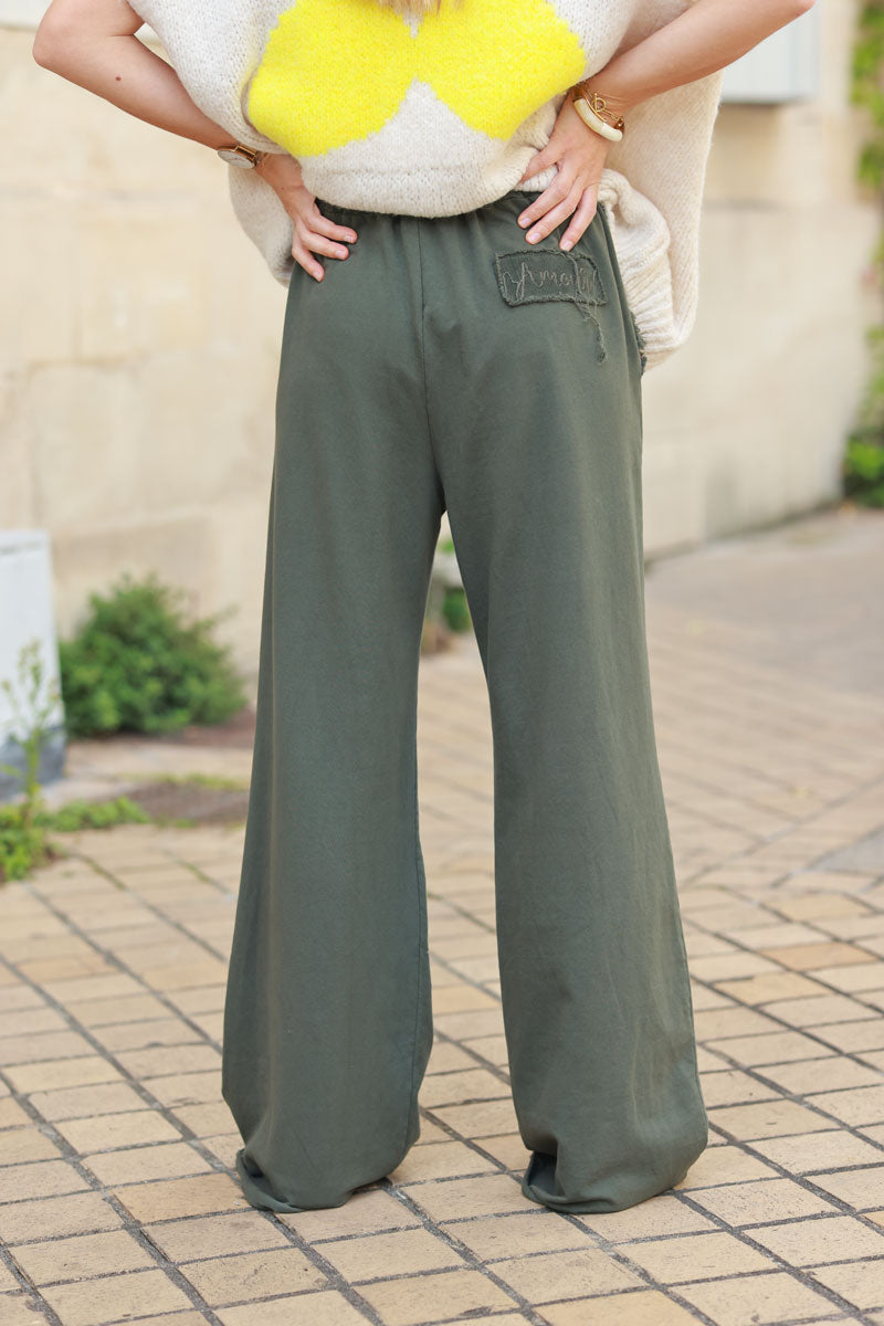 Khaki loose sweatpants with fringe detail pockets