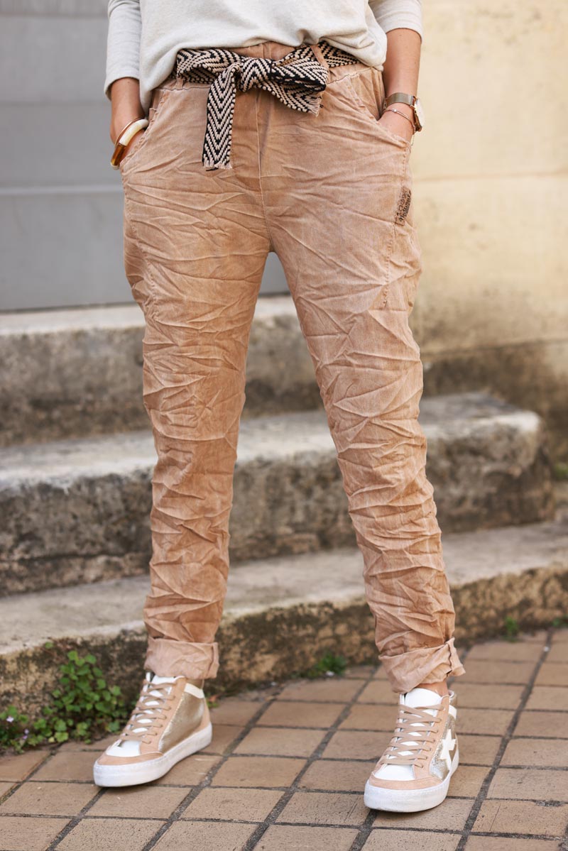 Washed camel comfort and stretch fabric trousers + chevron belt