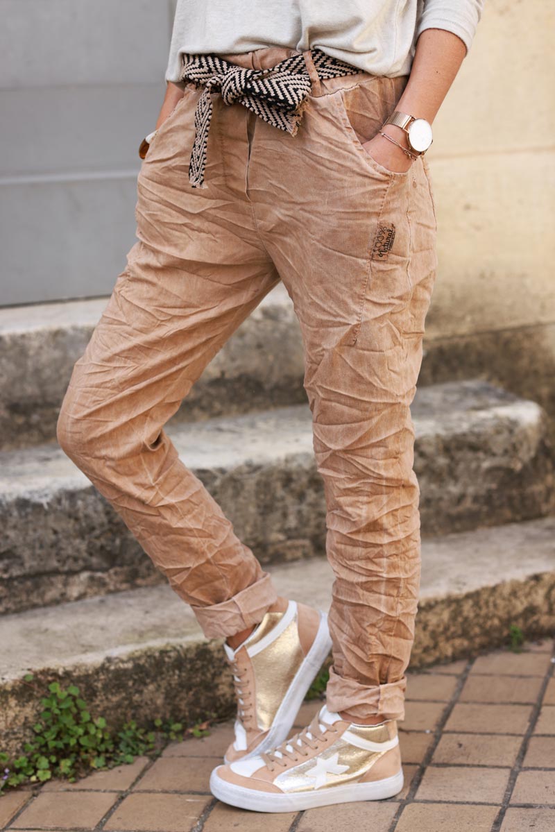 Washed camel comfort and stretch fabric trousers + chevron belt