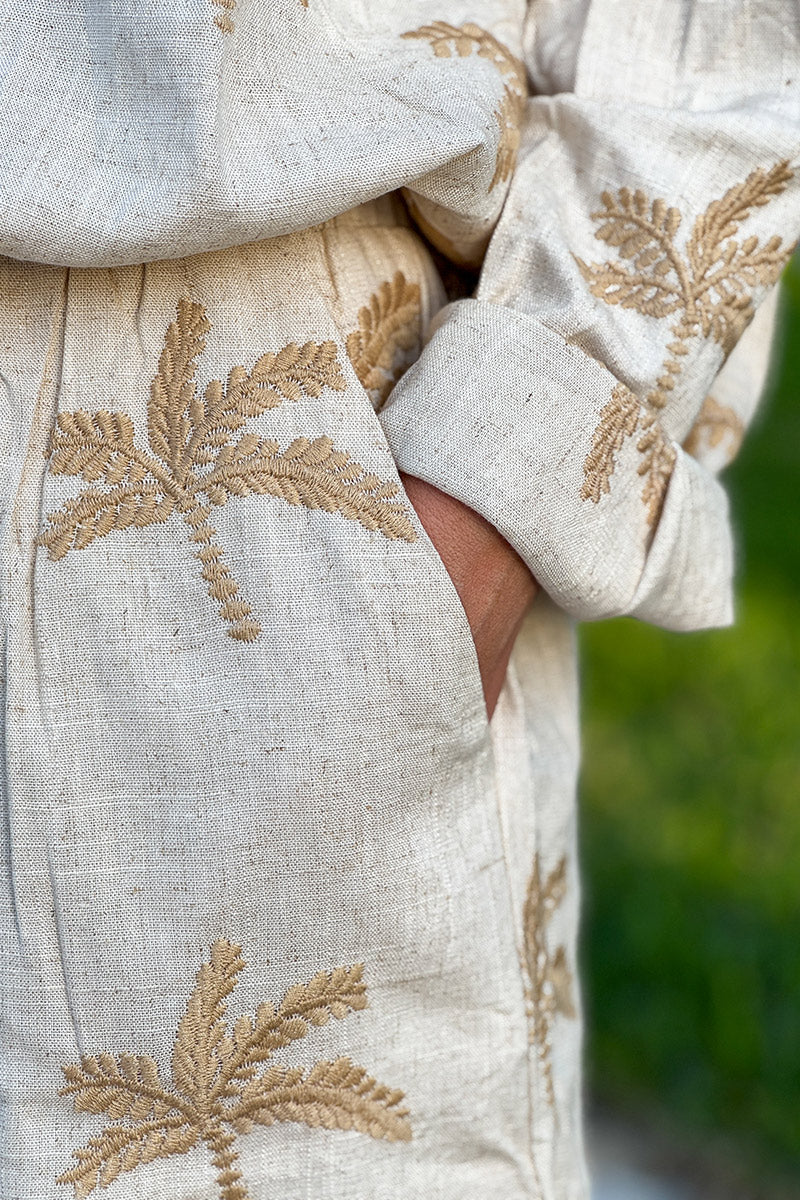 Pantalon fluide beige en lin mélangé broderie palmiers camel