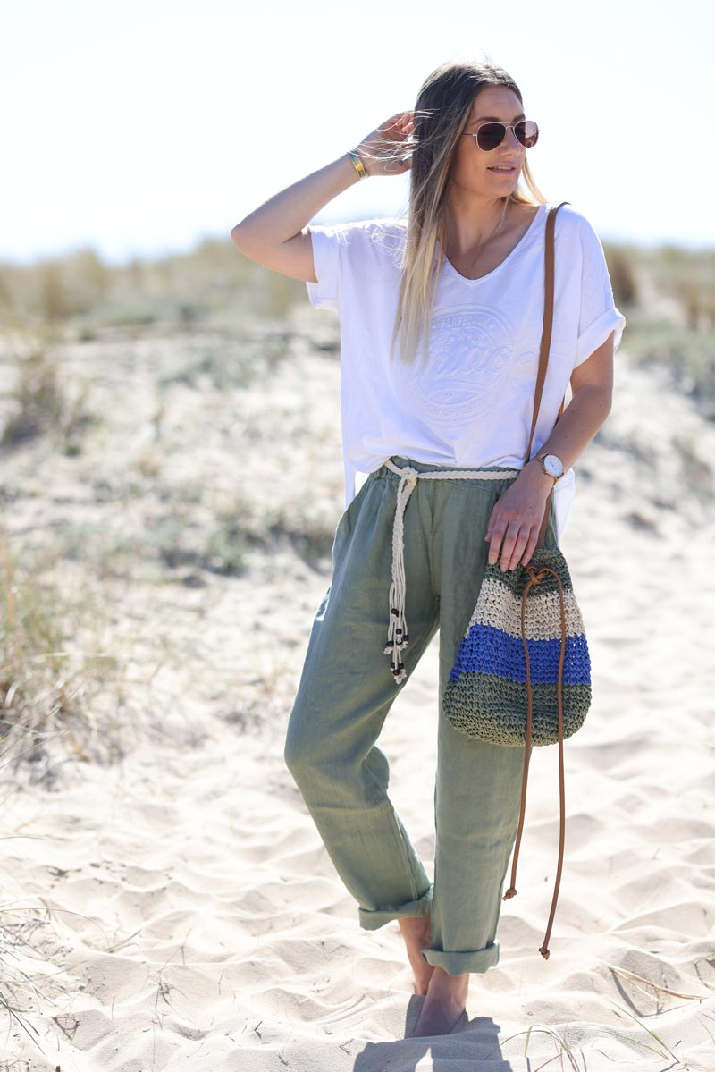 Khaki linen trousers with crochet and wooden beaded belt