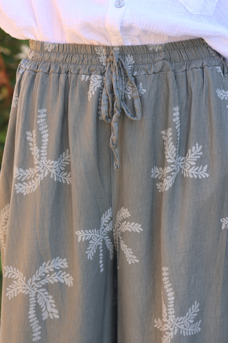 Khaki floaty wide leg pants with beige palm tree print