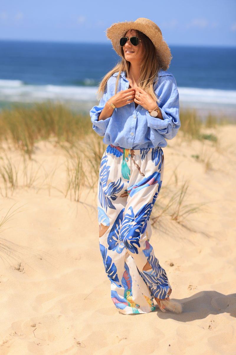 Wide leg ecru pants with blue watercolor palm and parrot print