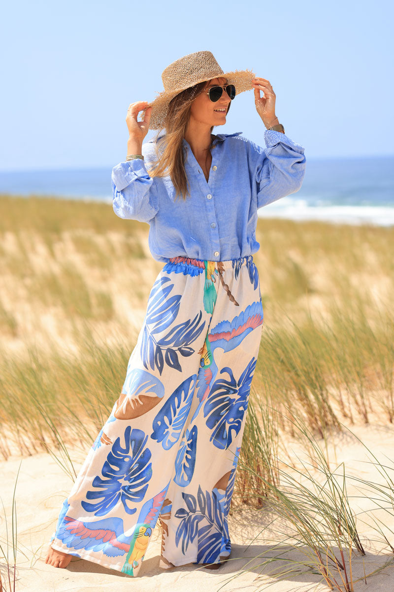 Wide leg ecru pants with blue watercolor palm and parrot print