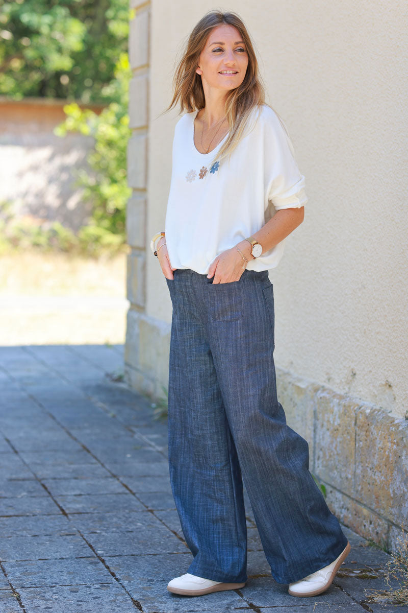 Blue denim wide leg pants with patch pockets