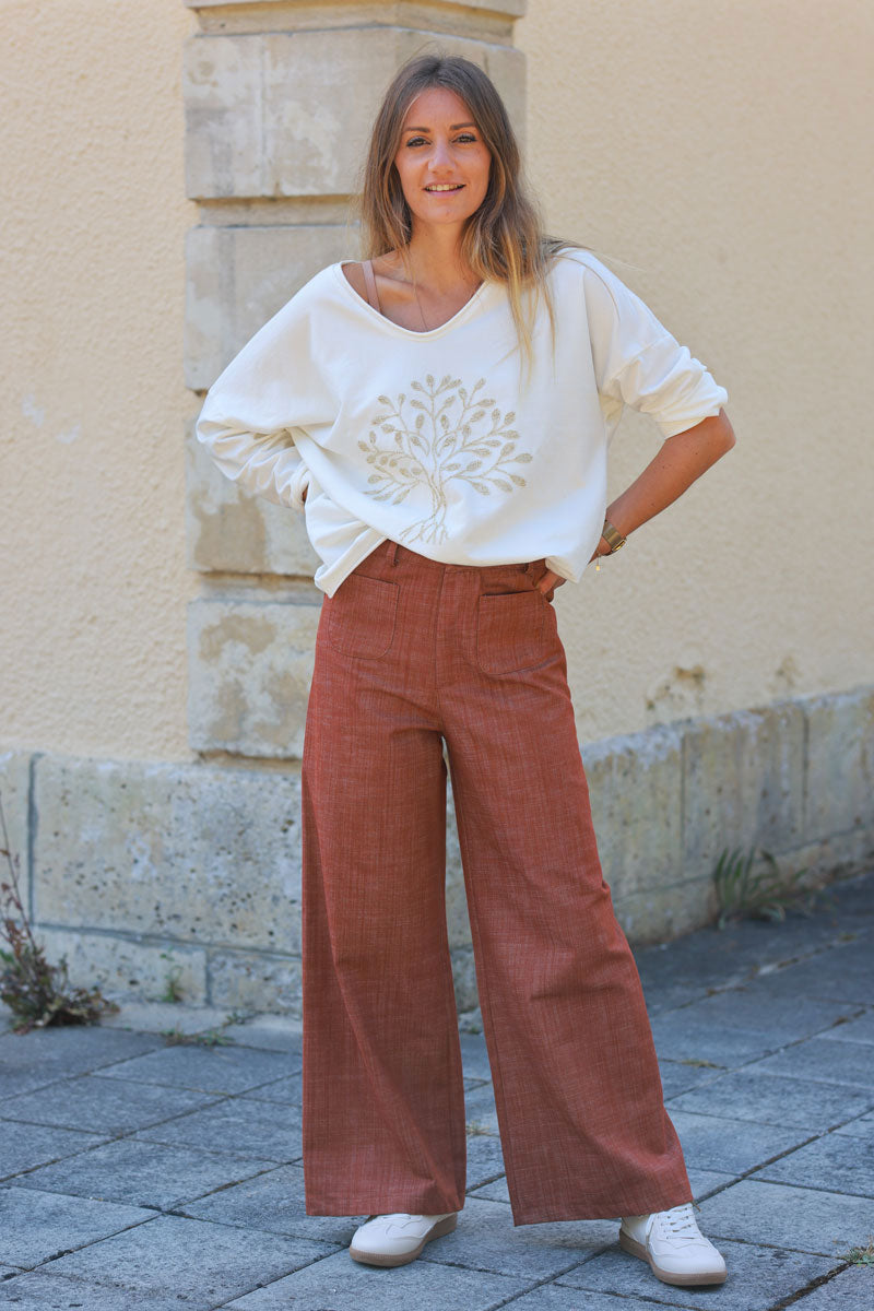 Pantalón ancho efecto denim terracota con bolsillos de parche