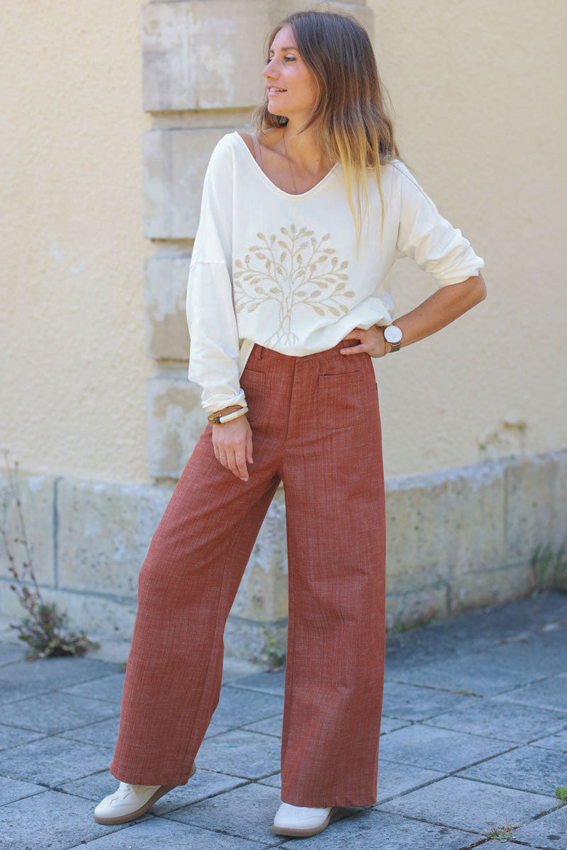 Terracotta denim wide leg pants with patch pockets