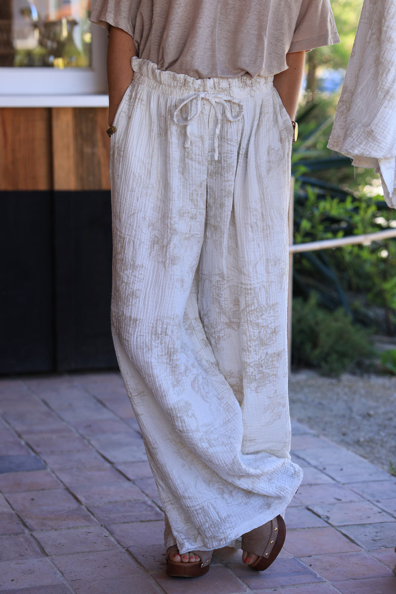 White crinkle cotton wide leg pants with beige toile de jouy print