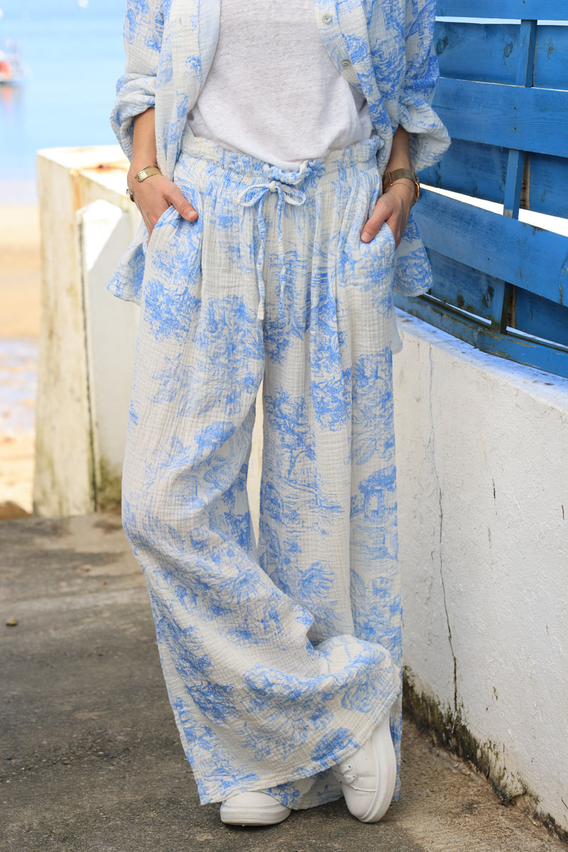 White crinkle cotton wide leg pants with sky blue toile de jouy print