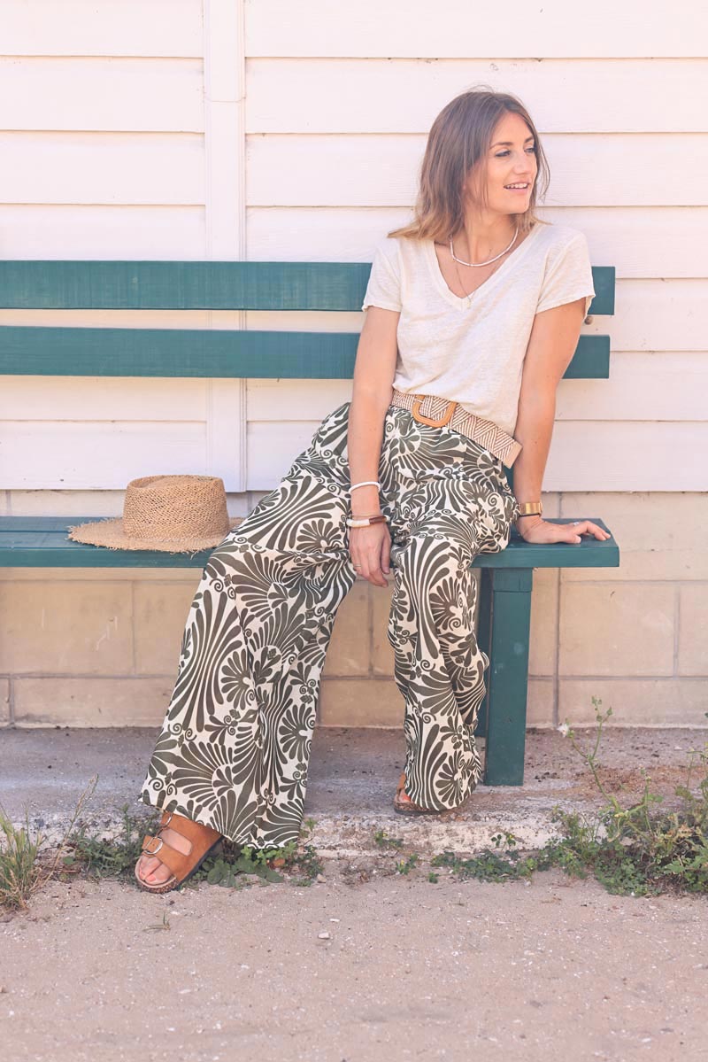 Wide leg linen blend pants with khaki abstract leaves print and raffia belt