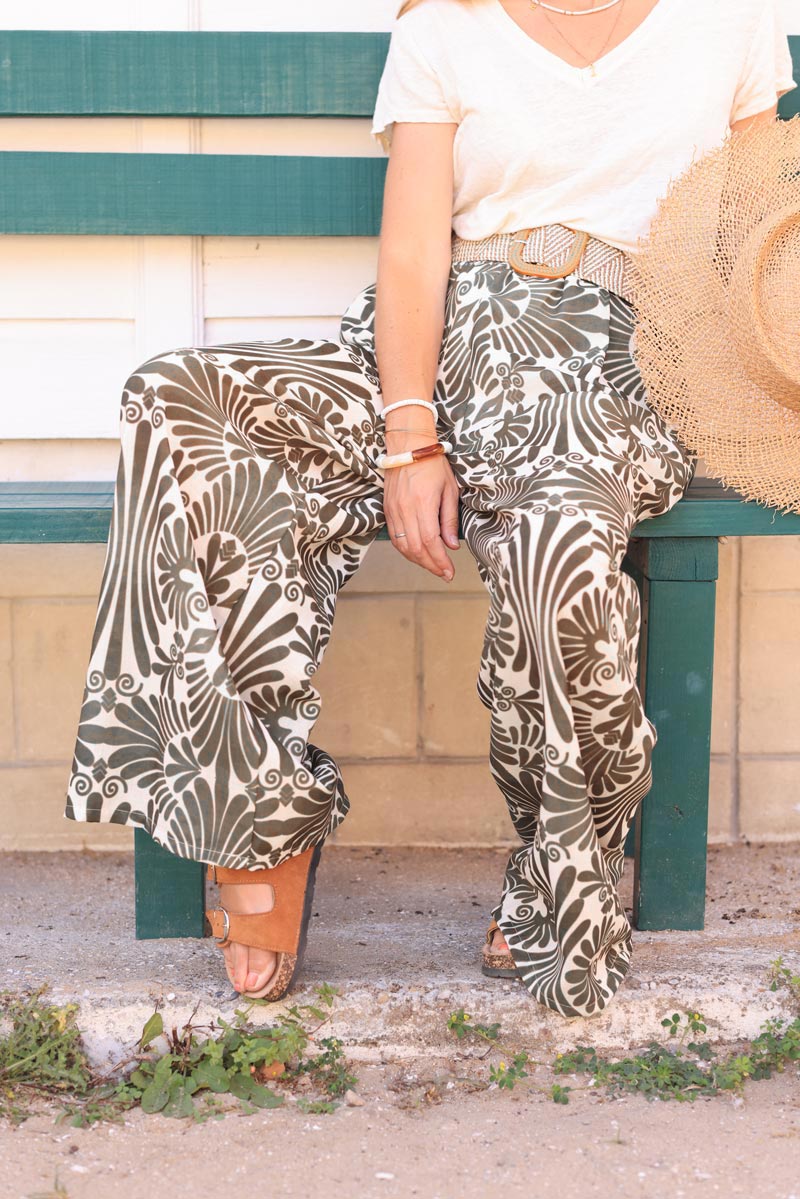 Wide leg linen blend pants with khaki abstract leaves print and raffia belt