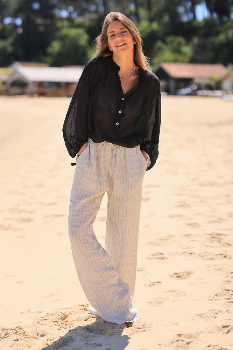 Linen wide leg floaty pants with thin black embroidered stripes