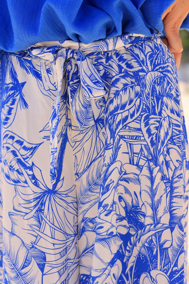 Royal blue wide leg floaty pants with palm leaf print and fabric belt