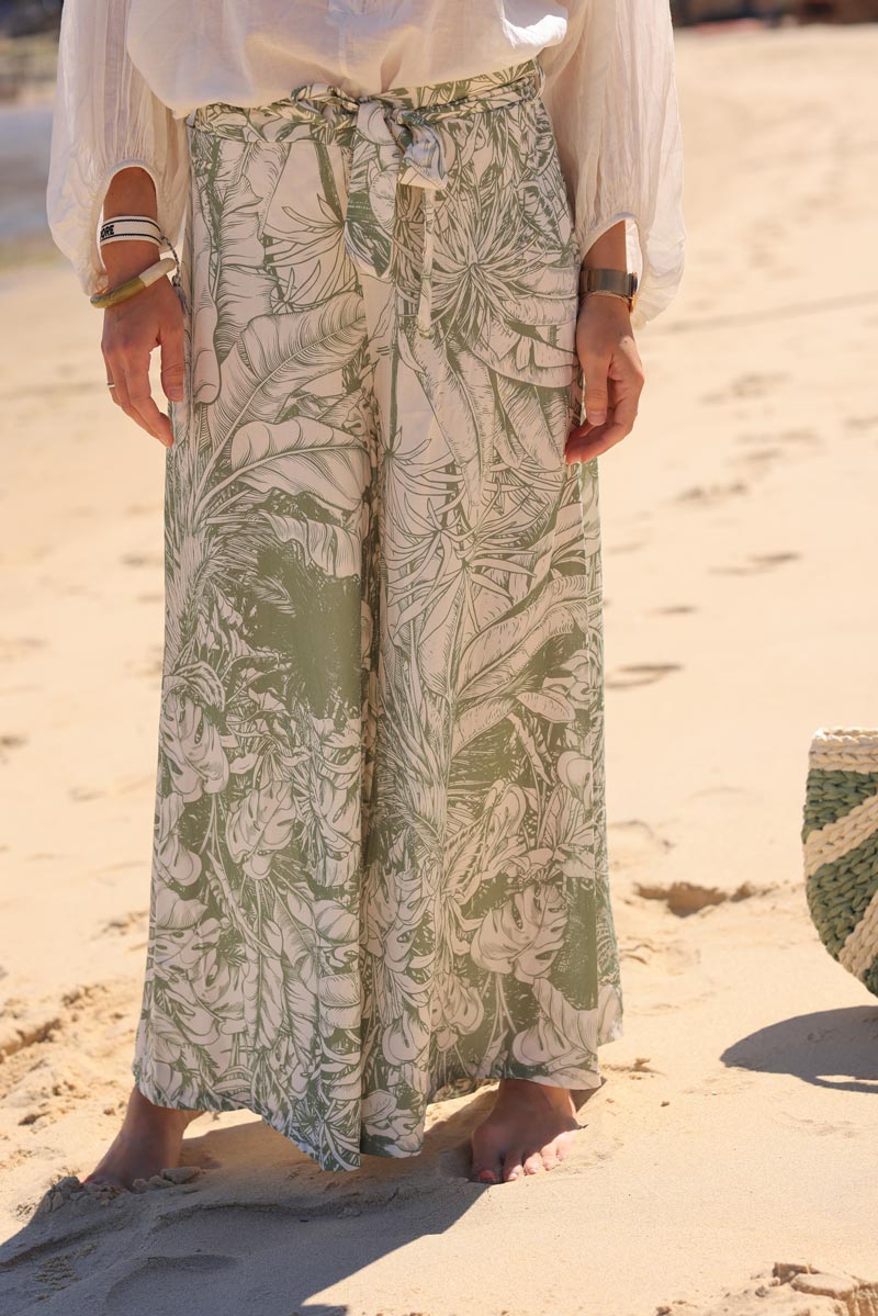Khaki wide leg floaty pants with palm leaf print and fabric belt