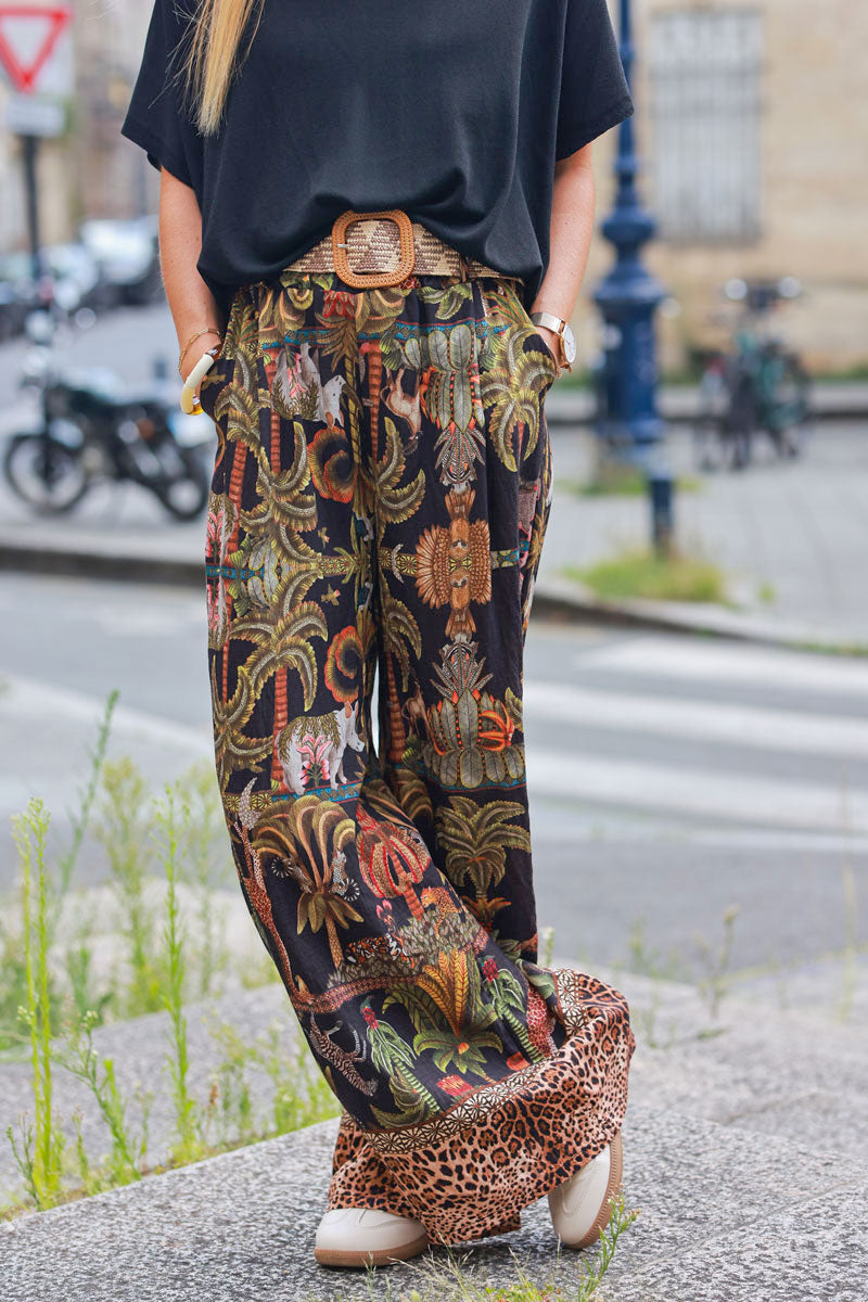 Pantalón negro ancho y suave con estampado de palmeras de la jungla y braguita de leopardo con cinturón