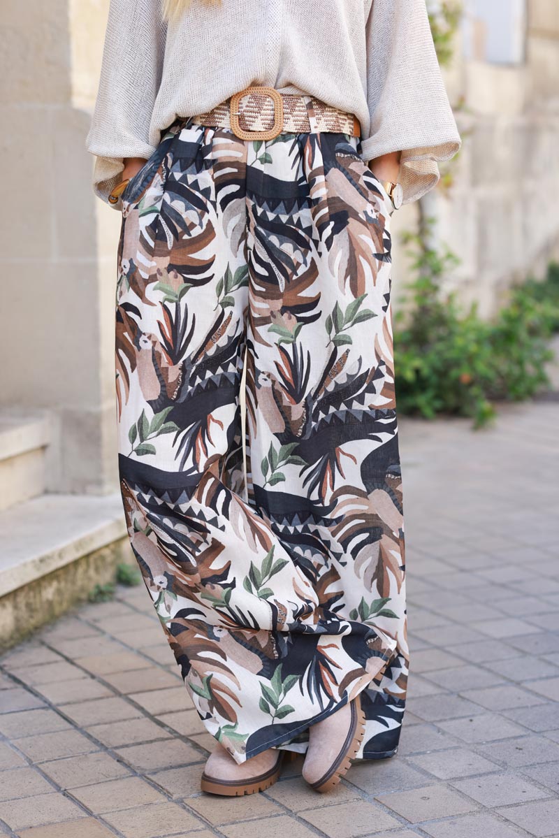 Wide leg linen blend pants with black and camel abstract leaves print and raffia belt