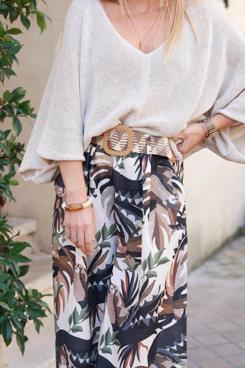 Wide leg linen blend pants with black and camel abstract leaves print and raffia belt