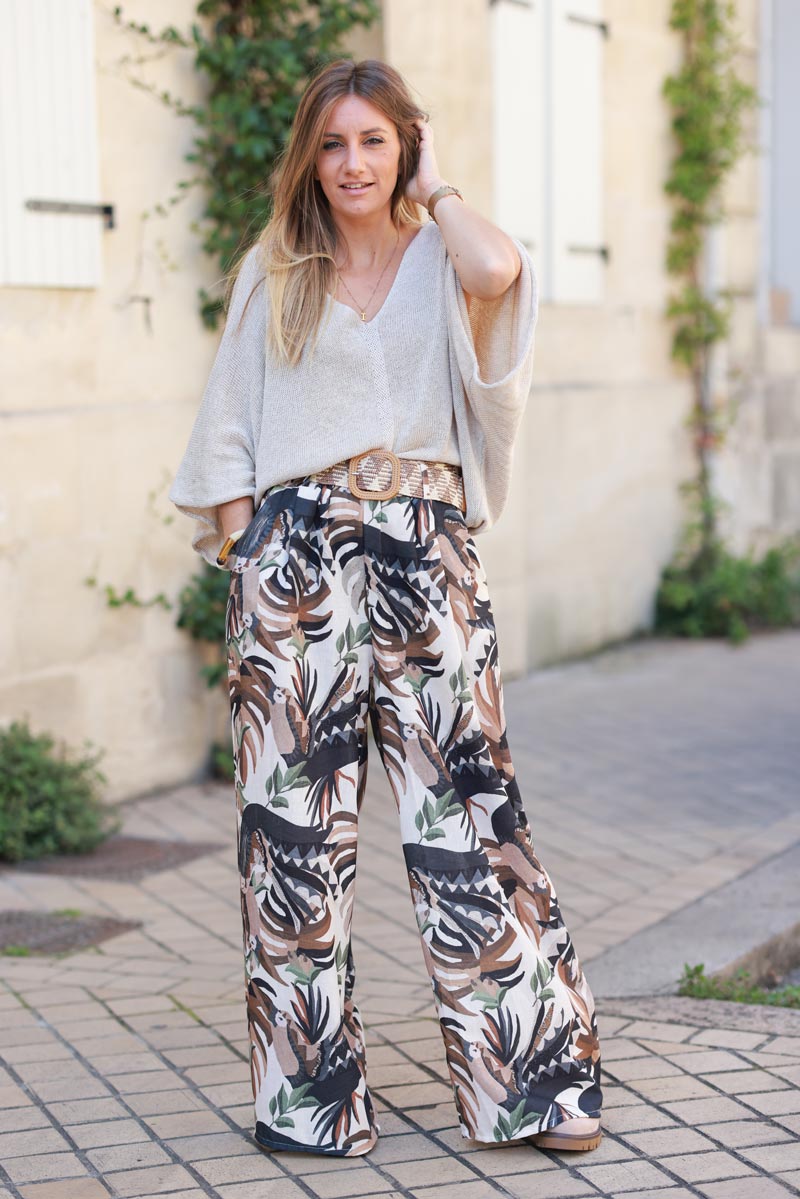 Wide leg linen blend trousers with black and camel abstract leaves print and raffia belt